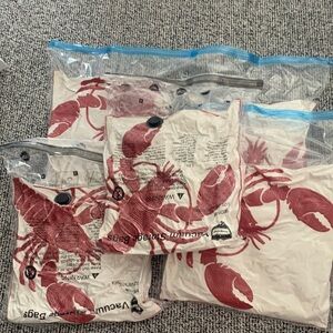 Vacuum Storage Bags with Red Lobster Print pillows. Used on a yacht.  Set of 5